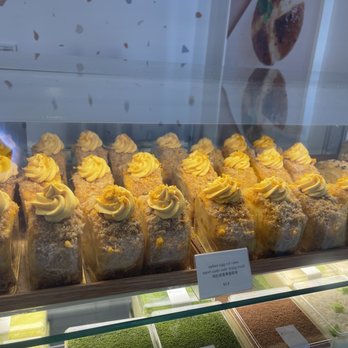 LA LA Bakeshop - Salted egg roll cake slides - Bakeries Near Me - Scarborough, Ontario