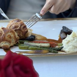 Beef Wellington. Nice presentation but, NO pink - was well done. Beef Wellington. Nice presentation but, NO pink - was well done.