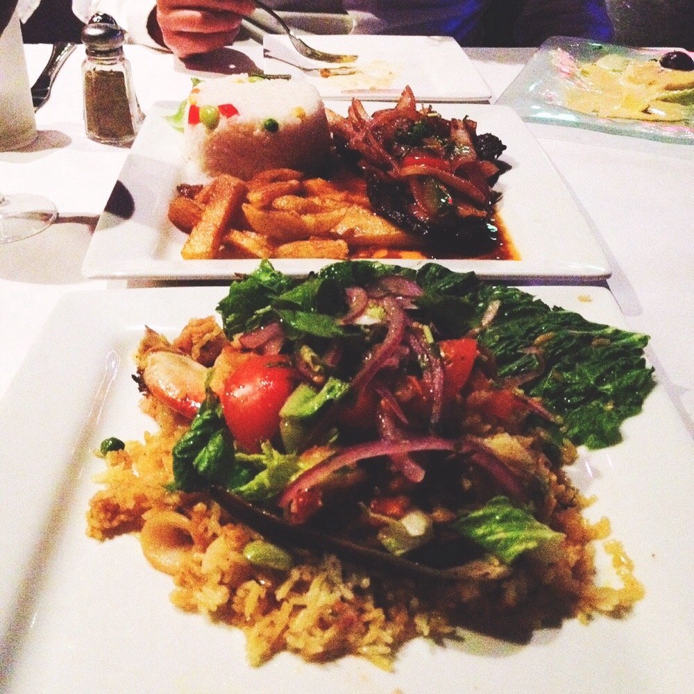 La Furia Chalaca - Arroz con mariscos (Peruvian Paella) packed with a mix of shrimp, calamari , crab and oysters . A must have ! - Peruvian Near Me - Oakland, California