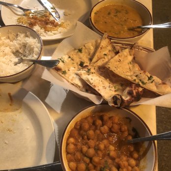 Om - Chana Masala Garlic Naan Bread - Indian Near Me - New York, New York Om - Chana Masala Garlic Naan Bread - Indian Near Me - New York, New York