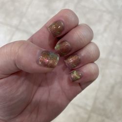 Cat eye polish changes color based on the angle the light hits it