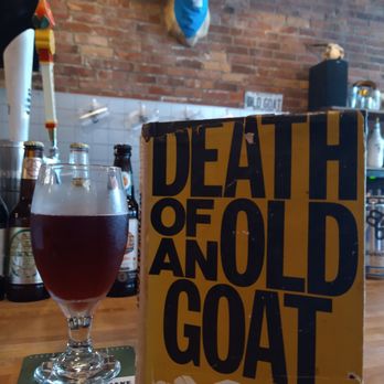 The Old Goat - Black Widow Cider and a book from their shelves - how appropriate a title - but nothing to do about Goats - Pubs Near Me - Richmond, Maine The Old Goat - Black Widow Cider and a book from their shelves - how appropriate a title - but nothing to do about Goats - Pubs Near Me - Richmond, Maine