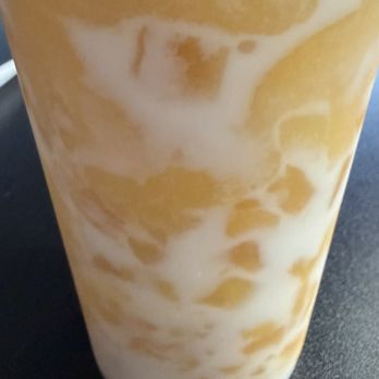 Mango Steen's - Mango lover smoothie filled with fresh mongo chunks - Chicken Wings Near Me - Seattle, Washington Mango Steen's - Mango lover smoothie filled with fresh mongo chunks - Chicken Wings Near Me - Seattle, Washington