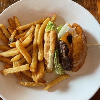 Rock & Brews - The Colony - Half a cheeseburger and French fries. - New American Near Me - The Colony, Texas Rock & Brews - The Colony - Half a cheeseburger and French fries. - New American Near Me - The Colony, Texas