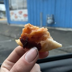 La Salvadorena Restaurant - Last bite of a scrumptious, generously stuffed chicken and cheese corn pupusa.