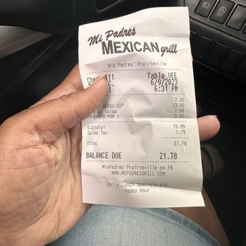 Mi Padre Mexican Cafe - a hand holding a receipt - Mexican Near Me - Prairieville, Louisiana