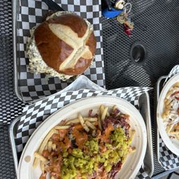 Bacon artichoke burger, and Ruben fries Bacon artichoke burger, and Ruben fries