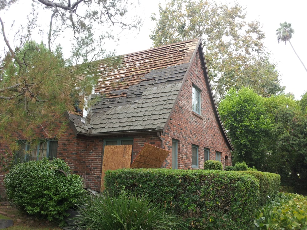 Slide of Tim Outzen Roofing