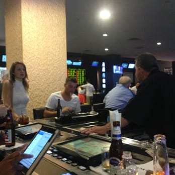 Playbar - a group of people at a bar - Sports Bars Near Me - Las Vegas, Nevada