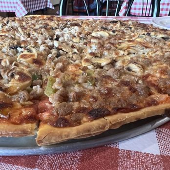 Guido's Pizza - Tontitown - Papa Guido's style side shot - Pizza Near Me - Tontitown, Arkansas Guido's Pizza - Tontitown - Papa Guido's style side shot - Pizza Near Me - Tontitown, Arkansas