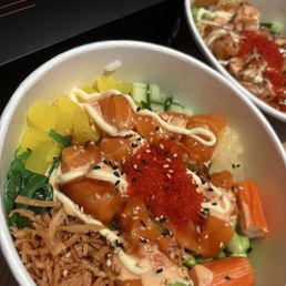Top: Torched poke Bottom: Classic salmon poke