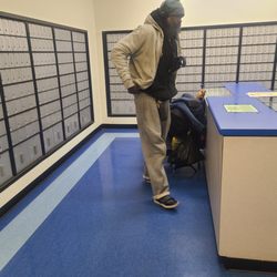 United States Post Office - Denbigh - HOMELESS GUY MAKING SHELTER OUT OF THE LOBBY, OBSTRUCTING ME GETTING TO MY P.O. BOX