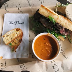 Steak Chimi sandwich. Tender slices of steak with charred onion goat cheese.