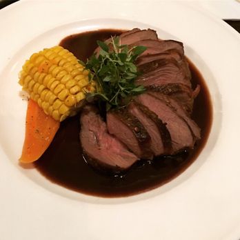 Restaurang Axela - Lamb w/Roasted Garlic Butter, Red Wine Sauce and Potatoes Au Gratin - Brasseries Near Me - Stockholm, Alberta Restaurang Axela - Lamb w/Roasted Garlic Butter, Red Wine Sauce and Potatoes Au Gratin - Brasseries Near Me - Stockholm, Alberta