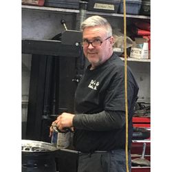 Rich's Car Works - Rich mounting a tire