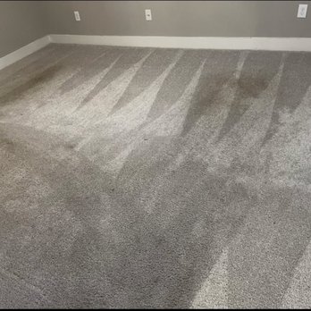 AMLI on Riverside - Carpet discoloration from foot traffic leading to the bed that was considered outside of normal wear & tear by AMLI - Apartments Near Me - Irving, Texas