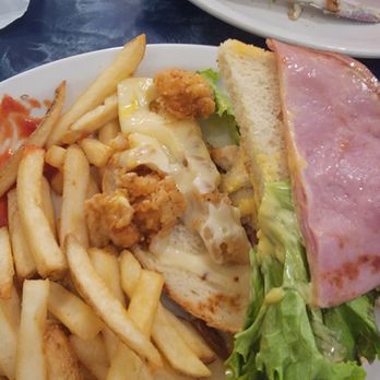 Liam's Deaner Brunch Bistro - Opened the sandwich to show 3 small chicken strips, likely from Harris Tetter and 2 pieces of lunch meat. Again, stale bread - Breakfast & Brunch Near Me - Suffolk, Virginia