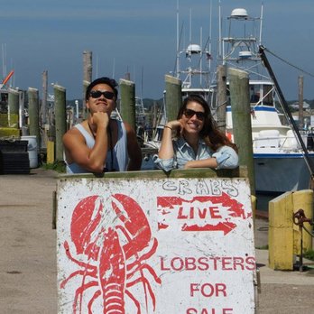 The Kristen J - two women standing in front of a lobster for sale sign - Seafood Markets Near Me - Narragansett, Rhode Island The Kristen J - two women standing in front of a lobster for sale sign - Seafood Markets Near Me - Narragansett, Rhode Island