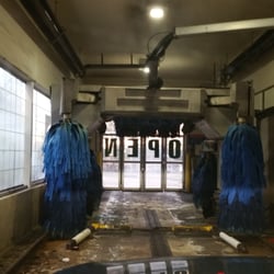 Chestnut Ridge Exxon Service Center - Inside the wash. The machines moves along the side of the car. Keep an eye out on the display for instructions.