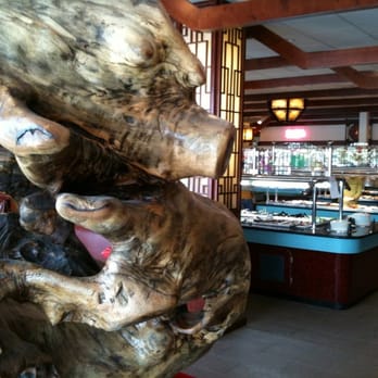 Shogun Buffet Hibachi Grill - Cool tree carving near the entrance to Shogun. - Chinese Near Me - Asheville, North Carolina Shogun Buffet Hibachi Grill - Cool tree carving near the entrance to Shogun. - Chinese Near Me - Asheville, North Carolina