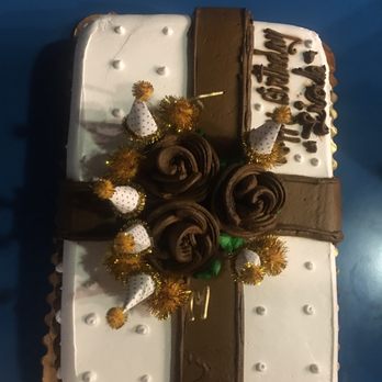 Los Tres Hermanos Bakery - Chocolate ribbon & Roses and tres leches con fresas y nueces.Delicious!I never it the frosting but I ate it . - Bakeries Near Me - San Jose, California