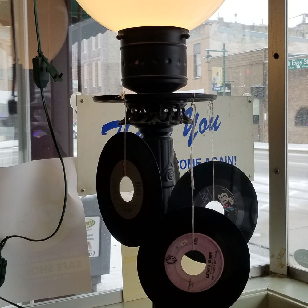 The Kitchen - a lamp with vinyl records attached to it - American Near Me - Owatonna, Minnesota The Kitchen - a lamp with vinyl records attached to it - American Near Me - Owatonna, Minnesota