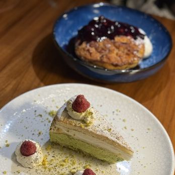 Aurora At The Celeste - Pistachio dessert and blueberry bread pudding - American Near Me - Orlando, Florida