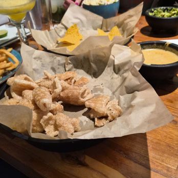 Jay’s Latin Kitchen - Fresh Chicharrones which was very good; also Chips & Queso in the background! - Latin American Near Me - Deale, Maryland