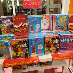 a display of cereal boxes a display of cereal boxes