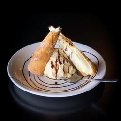 R Bar & Grill - Deep fried cheesecake rolled in a pastry tortilla, dusted with cinnamon and sugar and served with ice cream.