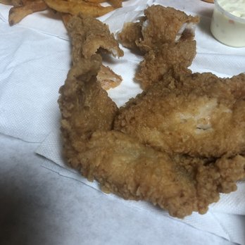 The Juicy Crab - Memphis - This was the meatier whiting fish, on napkins to absorb the grease. - Seafood Near Me - Memphis, Tennessee