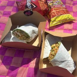 Buffalo Chicken Caesar Wrap, grilled and other is crispy chicken- brought our own chips