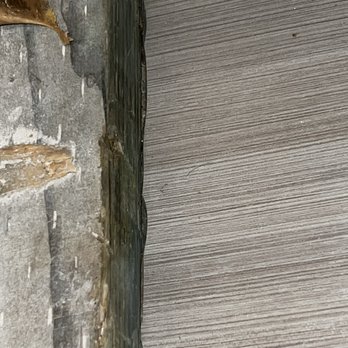 Toro Flooring - Flooring not flush to walls. Uneven cuts. Looks terrible. - Flooring Near Me Toro Flooring - Flooring not flush to walls. Uneven cuts. Looks terrible. - Flooring Near Me