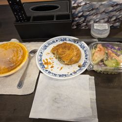 Mr Greek - Who puts spanakopita in an open pouch like that. The quality of service and food has gone down the drain at this location.