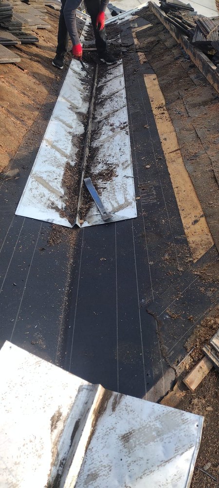 Slide of Echevarria Roofing