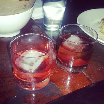 Eleanor's - A negroni (gin cocktail) and a Classic manhattan (whisky cocktail).  
Bartender- Shaun - Lounges Near Me - Smyrna, Georgia