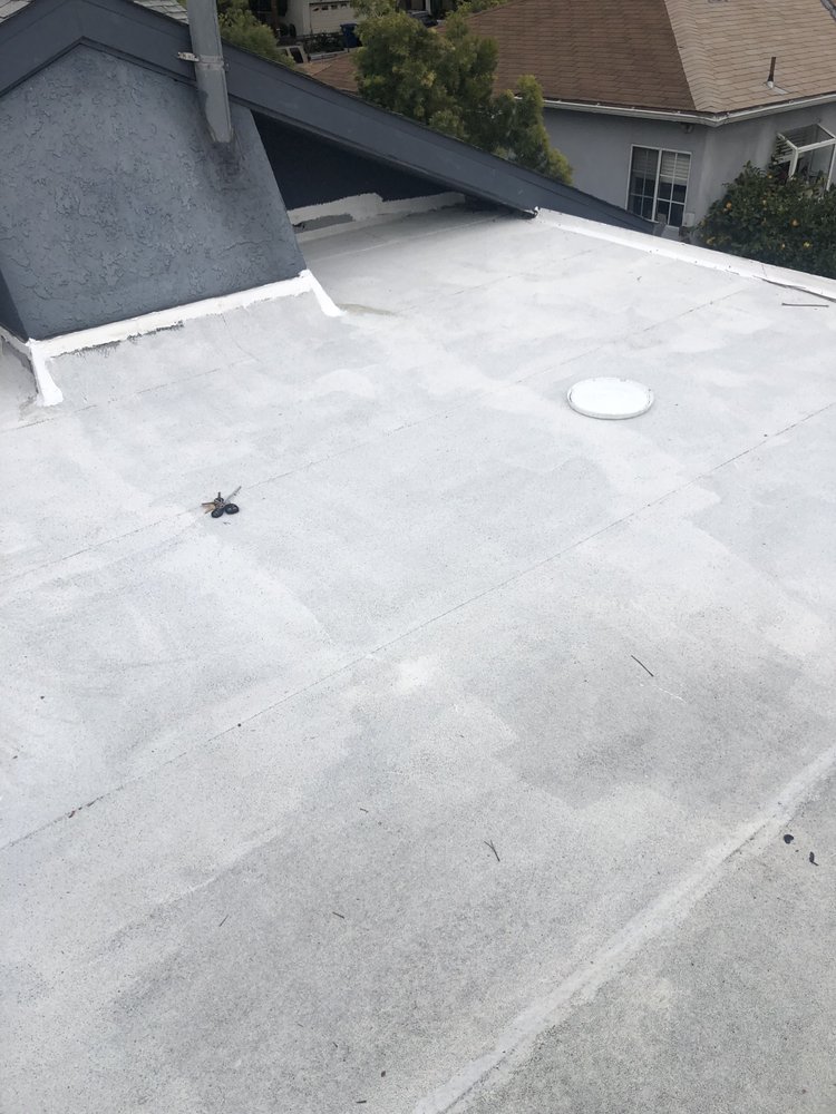 Slide of Huncho Roofer