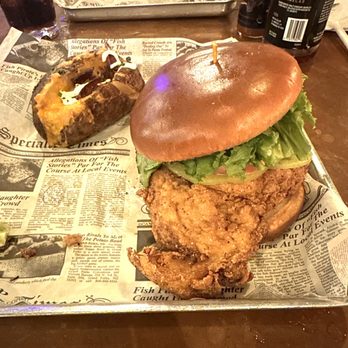 Prohibition Kitchen - Fried Chicken Sandwich with Baked Potato - Bars Near Me - St. Augustine, Florida Prohibition Kitchen - Fried Chicken Sandwich with Baked Potato - Bars Near Me - St. Augustine, Florida