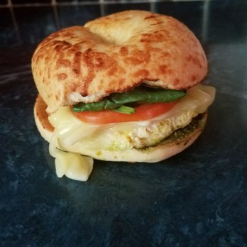 Zing Cafe - Their California style breakfast sandwich with egg, swiss cheese, tomato, avocado, spinach, and added pesto on an Asiago bagel. - Breakfast & Brunch Near Me - Carmel, Indiana