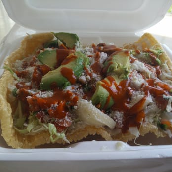 Elvira's Cakes - Giant chicharrone filled with salad stuffs and i believe squid! - Bakeries Near Me - Kansas City, Missouri Elvira's Cakes - Giant chicharrone filled with salad stuffs and i believe squid! - Bakeries Near Me - Kansas City, Missouri