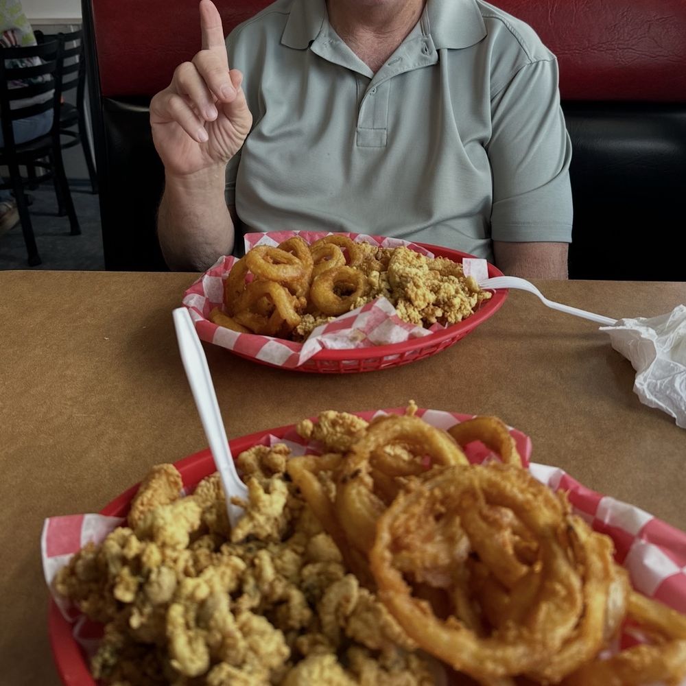 Fisherman platter and 1/2 & 1/2 whole Belly clams and scallops with their handmade onion rings! Delicious