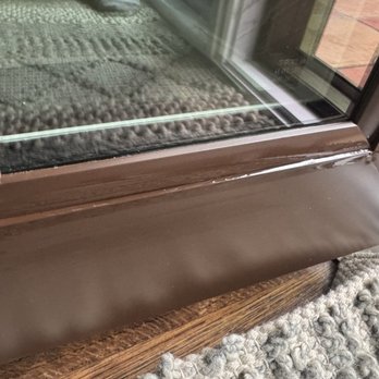 The Window Factory - Standing water remained trapped in the glazing channel after rain, with visible finish deterioration along the frame edge - Windows Installation Near Me - Simi Valley, California