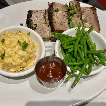Table 100 - My husband had the beef brisket , green beans & mac n cheese . The bbq sauce was smoked. Very yummy & tender . - New American Near Me - Flowood, Mississippi