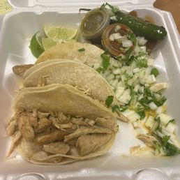 Double corn tortillas, unseasoned chicken and fluff.