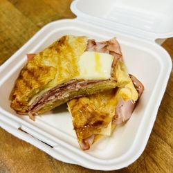 Nirvana Latte - Our delicious ham and Swiss on a croissant press with a homemade honey brown sugar glaze!