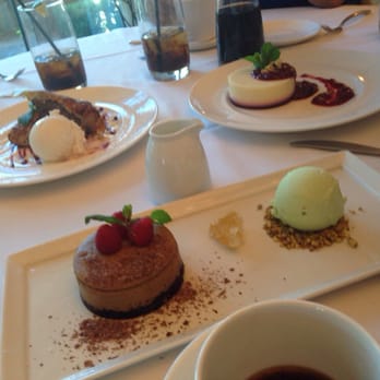 Vintner Grill - Raspberry and lemon panna cotta, banana strudel and Turkish coffee cheesecake with pistachio gelato and honey. - New American Near Me - Las Vegas, Nevada Vintner Grill - Raspberry and lemon panna cotta, banana strudel and Turkish coffee cheesecake with pistachio gelato and honey. - New American Near Me - Las Vegas, Nevada