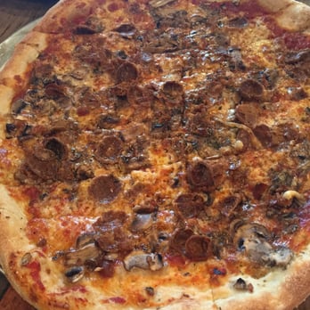 Flatbread Company - Pepperoni and mushroom flatbread pizza. The 16". - Pizza Near Me - Paia, Hawaii Flatbread Company - Pepperoni and mushroom flatbread pizza. The 16". - Pizza Near Me - Paia, Hawaii