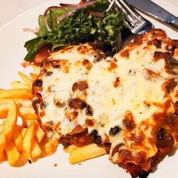 Rick's Place - Fancy a great Parma? Our schnitzel is house made, 
Gluten free? No problem, we have gluten free crumbs on site.