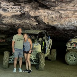 Out The Top Adventures - This rock shelter was our first stop for a quick break. Unfortunately people are leaving trash in there but it was cool otherwise.