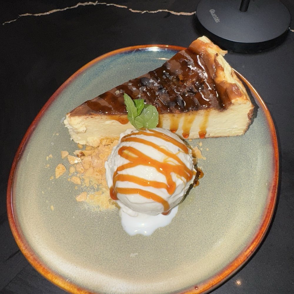Pears Restaurant - BASQUE CHEESECAKE & Truffle ice cream, verjus reduction - Asian Fusion Near Me - Markham, Ontario Pears Restaurant - BASQUE CHEESECAKE & Truffle ice cream, verjus reduction - Asian Fusion Near Me - Markham, Ontario